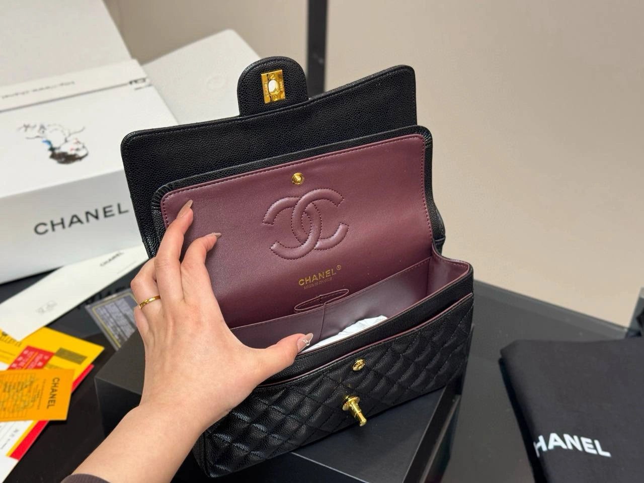 CHANEL Classic Flap Bag - Caviar Leather