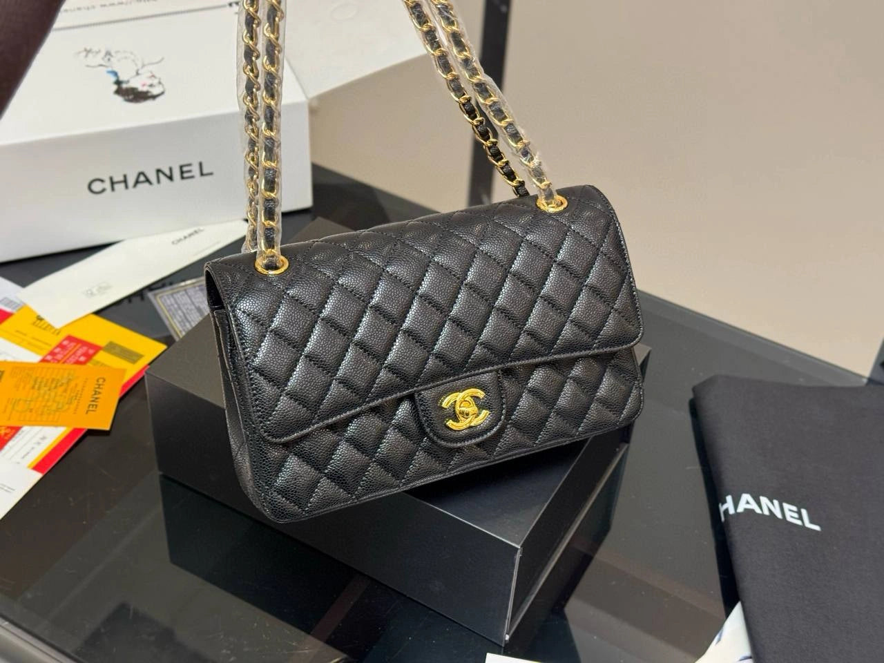 CHANEL Classic Flap Bag - Caviar Leather