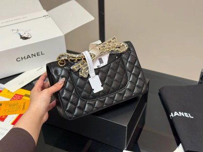 CHANEL Classic Flap Bag - Caviar Leather